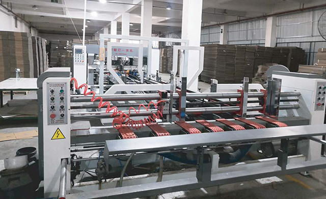 高速糊(hú)釘箱一體(tǐ)機